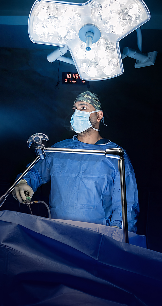 Dr. Ahmed Elwahidi conducting minimally invasive surgery in a modern operating room